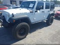 2014 Jeep Wrangler Unlimited — photo 2 of 17 | VIN 1C4BJWFG6EL163934