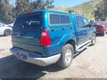 2001 Ford Explorer Sport Trac — photo 4 of 11 | VIN 1FMZU77E31UB26901