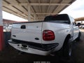 2003 Ford F-150 — photo 4 of 11 | VIN 1FTRX07203KB56607