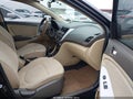 2012 Hyundai Accent — photo 5 of 11 | VIN KMHCU4AE7CU057727