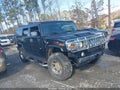 2005 Hummer H2 — photo 13 of 16 | VIN 5GRGN23U05H103341