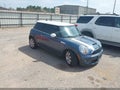 2010 Mini Cooper — photo 1 of 11 | VIN WMWMF7C59ATZ72838
