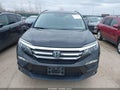 2016 Honda Pilot — photo 12 of 16 | VIN 5FNYF6H00GB051552