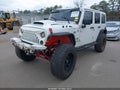 2013 Jeep Wrangler Unlimited — photo 2 of 18 | VIN 1C4HJWDG3DL578379