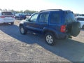 2002 Jeep Liberty — photo 3 of 11 | VIN 1J4GK58K42W115495