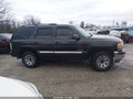 2003 GMC Yukon — photo 13 of 17 | VIN 1GKEC13V83R249726