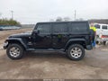 2012 Jeep Wrangler Unlimited — photo 14 of 16 | VIN 1C4BJWEG9CL132305