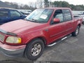 2002 Ford F-150 — photo 2 of 13 | VIN 1FTRW07672KD78744