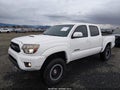 2015 Toyota Tacoma — photo 2 of 19 | VIN 5TFLU4EN7FX145470