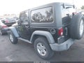 2017 Jeep Wrangler — photo 14 of 16 | VIN 1C4GJWAG9HL727433