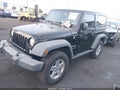 2017 Jeep Wrangler — photo 2 of 16 | VIN 1C4GJWAG9HL727433