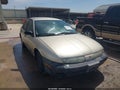 1999 Saturn Sl1 — photo 12 of 14 | VIN 1G8ZH5280XZ193721