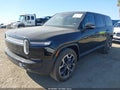 2025 Rivian R1S — photo 2 of 18 | VIN 7PDSGBBA5SN055497