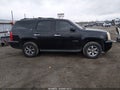 2011 GMC Yukon — photo 13 of 20 | VIN 1GKS2CE02BR348253
