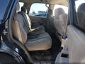 2004 Chevrolet Tahoe — photo 8 of 13 | VIN 1GNEC13T54J275847