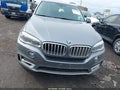 2014 BMW X5 — photo 12 of 16 | VIN 5UXKR0C59E0H23005