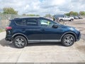 2018 Toyota RAV4 — photo 13 of 16 | VIN 2T3ZFREV4JW498490