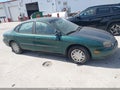 1999 Ford Taurus — photo 6 of 14 | VIN 1FAFP53U6XA142199