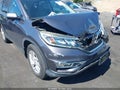 2016 Honda CR-V — photo 12 of 17 | VIN 3CZRM3H57GG701146