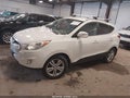 2013 Hyundai Tucson — photo 2 of 11 | VIN KM8JUCACXDU763172