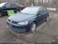 2014 Volkswagen Jetta — photo 2 of 11 | VIN 3VWD17AJ0EM314666