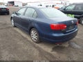 2014 Volkswagen Jetta — photo 3 of 11 | VIN 3VWD17AJ0EM314666