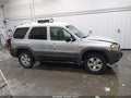 2003 Mazda Tribute — photo 13 of 17 | VIN 4F2YZ04113KM37459