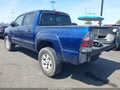 2015 Toyota Tacoma — photo 3 of 20 | VIN 3TMJU4GN1FM186770