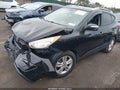 2012 Hyundai Tucson — photo 2 of 17 | VIN KM8JUCACXCU417704