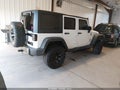 2014 Jeep Wrangler Unlimited — photo 4 of 18 | VIN 1C4BJWDG0EL225850