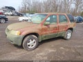 2003 Ford Escape — photo 2 of 11 | VIN 1FMYU92113KA03043