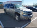 2009 Chevrolet Suburban 1500 — photo 1 of 11 | VIN 1GNFK26349R254845