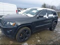 2014 Jeep Grand Cherokee — photo 14 of 16 | VIN 1C4RJFAG2EC566721
