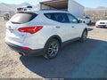 2014 Hyundai Santa Fe — photo 4 of 17 | VIN 5XYZUDLA1EG175155