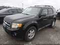 2012 Ford Escape — photo 2 of 12 | VIN 1FMCU9DG9CKA24041