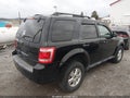 2012 Ford Escape — photo 4 of 12 | VIN 1FMCU9DG9CKA24041