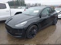 2022 Tesla Model Y — photo 2 of 18 | VIN 7SAYGDEFXNF551048