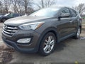 2013 Hyundai Santa Fe — photo 2 of 16 | VIN 5XYZWDLA9DG094932