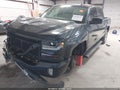 2018 Chevrolet Silverado 1500 — photo 2 of 16 | VIN 3GCUKREC2JG462947