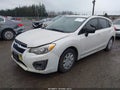 2013 Subaru Impreza — photo 2 of 13 | VIN JF1GPAA6XD2857431