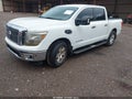2017 Nissan Titan — photo 2 of 16 | VIN 1N6AA1E67HN501273
