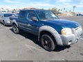 2003 Nissan Frontier — photo 1 of 12 | VIN 1N6ED27T73C466725