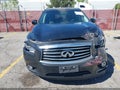 2015 Infiniti QX60 — photo 12 of 16 | VIN 5N1AL0MN2FC535965