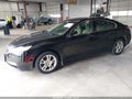 2009 Acura TL — photo 2 of 12 | VIN 19UUA86509A009886