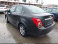 2014 Chevrolet Sonic — photo 3 of 11 | VIN 1G1JC5SG0E4230942