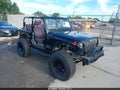 2013 Jeep Wrangler — photo 1 of 11 | VIN 1C4AJWAG1DL644370