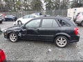 2003 Mazda Protege — photo 14 of 18 | VIN JM1BJ245231127550
