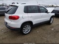 2014 Volkswagen Tiguan — photo 4 of 22 | VIN WVGAV3AX5EW613282