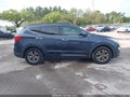 2016 Hyundai Santa Fe — photo 13 of 16 | VIN 5XYZU3LB1GG376138
