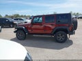 2010 Jeep Wrangler Unlimited — photo 14 of 16 | VIN 1J4BA6H1XAL139455